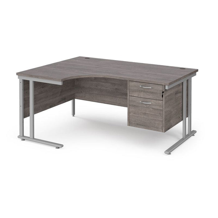 Maestro 25 left hand ergonomic corner desk with 2 drawer pedestal Desking Dams Grey Oak Silver 1600mm x 1200mm